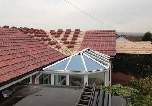 laying new roof tiles by r worthington and sons roofing bolton